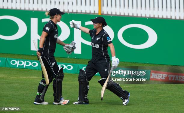 New Zealand batsman Sophie Devine is congratulated by team mate Katey Martin after being dismissed for 93 runs during the ICC Women's World Cup 2017...
