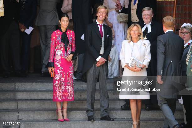 Prince Christian of Hanover and his fiancee Alessandra de Osma and his mother Chantal Hochuli, former of Hanover leaves the wedding of Prince Ernst...