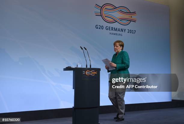 German Chancellor Angela Merkel arrives for the final press conference on the second day of the G20 Summit in Hamburg, Germany, July 8, 2017. Leaders...