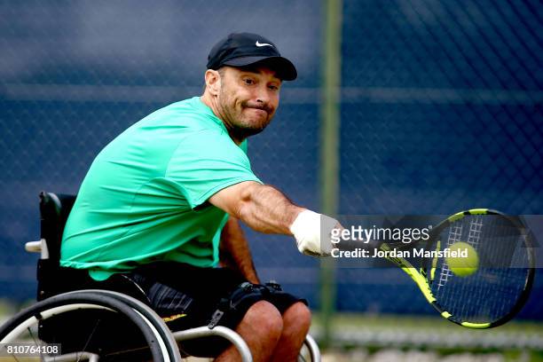 David Wagner of the USA plays a backhand during his Quad Singles Final match against Andy Lapthorne of Great Britain during day three of the Surbiton...