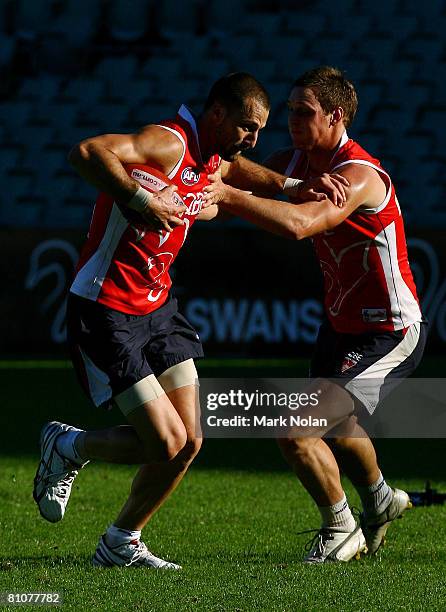 Nick Malceski of the Swans is tackled during a Sydney Swans AFL training session at the Sydney Cricket Ground on May 14, 2008 in Sydney, Australia.