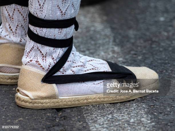 foot of a man with slippers and traditional summers socks in a holiday in the street outdoors. fallas in valencia - espadriller bildbanksfoton och bilder