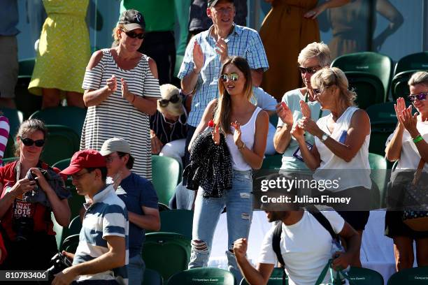 Ester Satorova, girlfreind of Tomas Berdych of The Czech Republic claps during the Gentlemen's Singles third round match between Tomas Berdych of The...