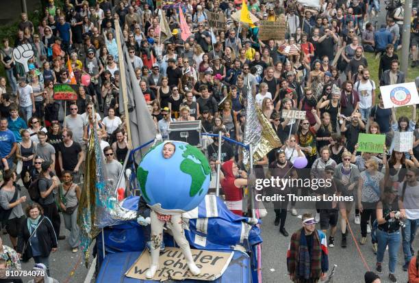 Tens of thousands demonstrate during a protesters march against the G20 Summit with the topic 'Solidarity without borders instead of G20!' on July 8,...