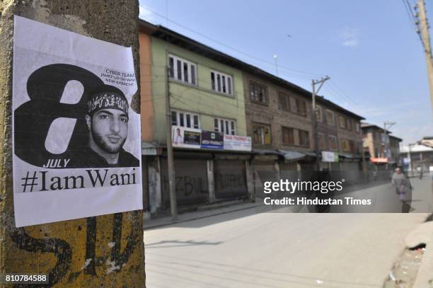 Burhan Wani poster on the pole during curfew in Lal Chowk area, on July 8, 2017 in Srinagar, India. Authorities imposed curfew in some parts of...