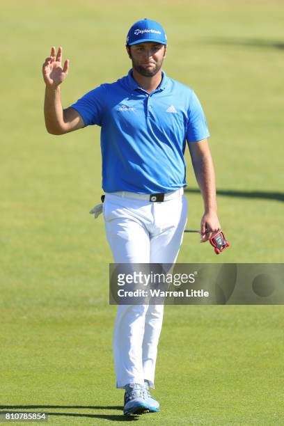 Jon Rahm of Spain acknowledges the crowd on the 18th green during day three of the Dubai Duty Free Irish Open at Portstewart Golf Club on July 8,...