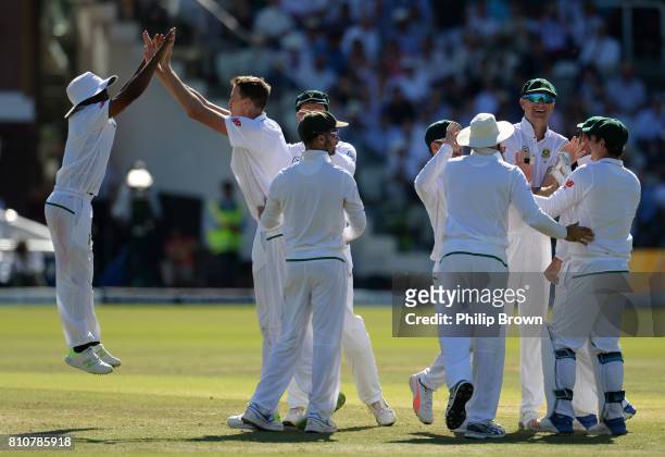 Temba Bavuma and Morne Morkel of South Africa celebrate after the dismissal of Keaton Jennings of England during day three of the 1st Investec Test...