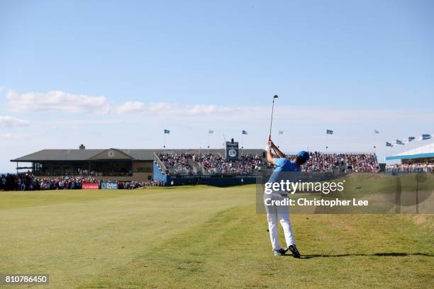 Jon Rahm of Spain hits an approach to the 18th green during day three of the Dubai Duty Free Irish Open at Portstewart Golf Club on July 8, 2017 in...