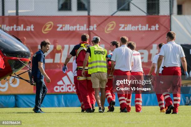 Abdelhak Nouri of Ajax is transported to the rescue helicopter during the friendly match between Ajax Amsterdam and SV Werder Bremen at Lindenstadion...