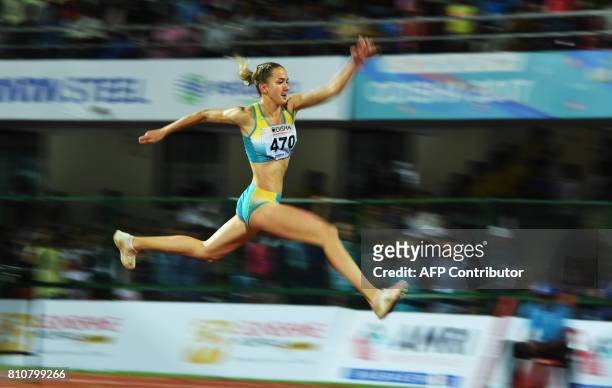 Kazakshtan's Maria Ovchinnikova competes in the women's Triple Jump event to win the Gold Medal, during the third day of the 22nd Asian Athletics...