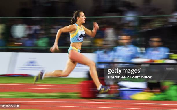 Kazakshtan's Irina Ektova competes in the women's Triple Jump event to win the Silver Medal, during the third day of the 22nd Asian Athletics...