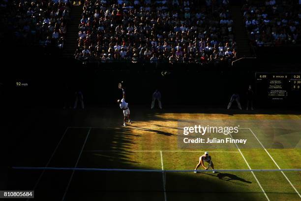 Liam Broady of Great Britain serves during the Mixed Doubles first round match with Naomi Broady of Great Britain against Roman Jebavy of the Czech...