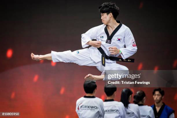 Members of the Kukkiwon Taekwondo Team perform a Taekwondo demonstration during the London Korean Festival 2017 at Olympia London on July 8, 2017 in...