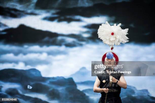 Member from Korean drumming group Tago performs live on stage during the London Korean Festival 2017 at Olympia London on July 8, 2017 in London,...