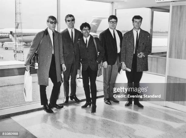 English pop group, Freddie and the Dreamers at London Airport , 19th April 1965. Left to right: Derek Quinn, Bernie Dwyer , Freddie Garrity , Pete...