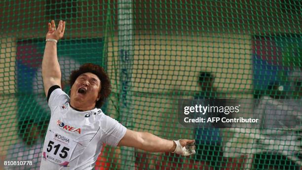 South Korea's Yudai Kimura competes in the men's hammer throw event to win Bronze Medal, during the third day of the 22nd Asian Athletics...