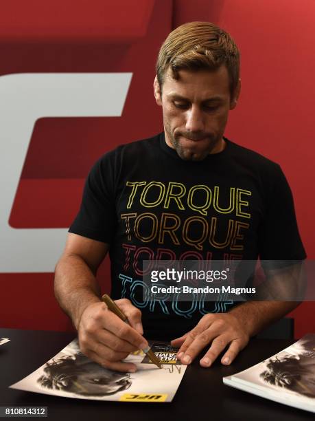 Urijah Faber meets with fans during an autograph session at T-Mobile Arena on July 8, 2017 in Las Vegas, Nevada.