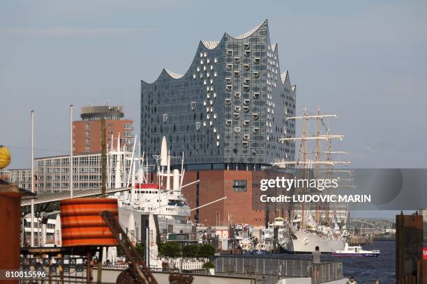 Ships moar in front of the Elbphilharmonie concert hall in the background on July 8, 2017 in Hamburg, northern Germany as world leaders meet during...