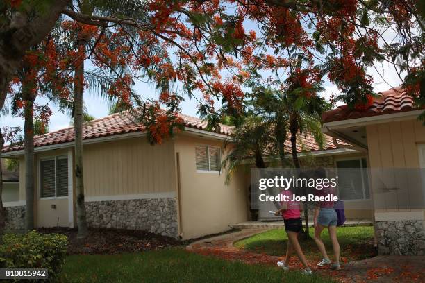 Joan Glenny and Joyce Lara representatives of Planned Parenthood canvass a neighborhood to educate people about the mosquito-borne Zika virus on July...