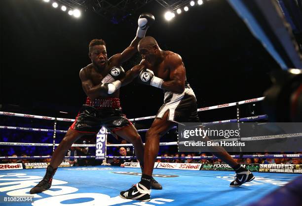 Darryll Williams of Great Britain and Jahmaine Smyle of Great Britain exchange blows during their English Super-Middleweight Championship bout at...