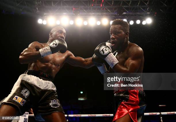 Darryll Williams of Great Britain and Jahmaine Smyle of Great Britain exchange blows during their English Super-Middleweight Championship bout at...