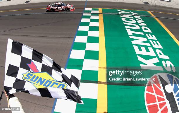 Kyle Busch, driver of the NOS Energy Drink Rowdy Toyota, wins the NASCAR XFINITY Series Alsco 300 at Kentucky Speedway on July 8, 2017 in Sparta,...