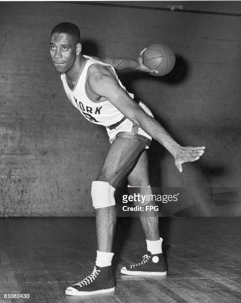 Portrait of American basketball player Nathaniel Clifton of the New York Knicks , Novemeber 1950. Clifton was the first African American player to...