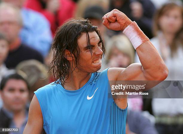 Rafael Nadal of Spain celebrates after winning his match against Potito Starace of Italy during day three of the Tennis Masters Series Hamburg at...