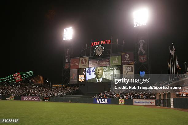 The scoreboard displays Hank Aaron speaking to the crowd after Barry Bonds of the San Francisco Giants hit his record breaking 756 career home run...