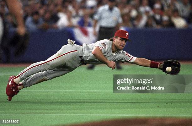 Dave Hollins of the Philadelphia Phillies dives for a ball during the 1993 World Series Game 2 against the Toronto Blue Jays on October 17, 1993 in...