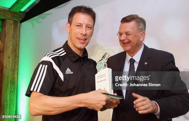 Referee Wolfgang Stark is awarded as referee of the year 2017 by Reinhard Grindel, head of the DFB during the awarding ceremony on July 8, 2017 in...