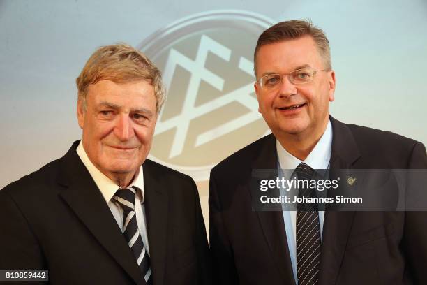 Referee Arno Schmidhuber and Reinhard Grindel, head of the DFB during the awarding ceremony 'Referee Of The Year' on July 8, 2017 in Grassau, Germany.