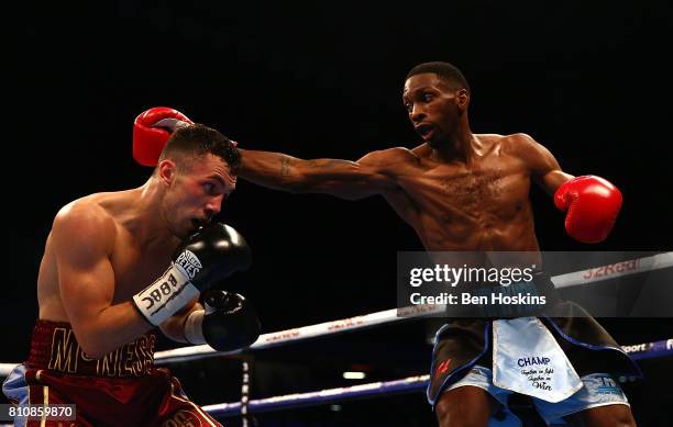 Asina Byfield of Great Britain and Sam McNess of Great Britain exchange blows during their Southern Area Super-Welterweight Championship bout at...