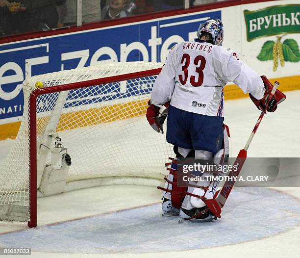 Norway's goalie Pal Grotnes reacts after giving up a goal by Canada during the quarterfinals of the 2008 IIHF World Hockey Championships at the...