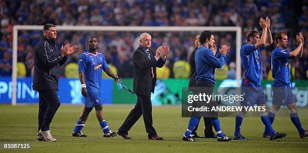 Rangers manager Walter Smith followed by French forward Jean-Claude Darcheville and teammates thank supporters after the UEFA Cup final match between...