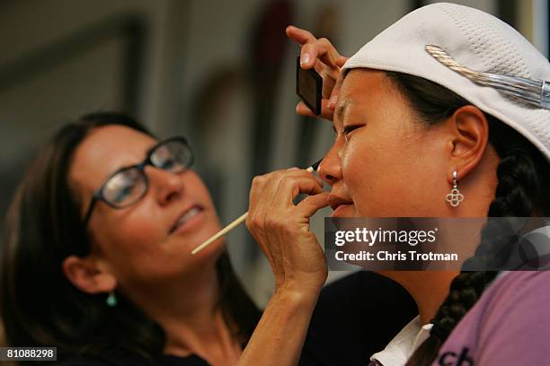 Golfer Christina Kim has her make up applied by makeup artist Bobbi Brown at her the Bobbi Brown studio on May 14, 2008 in Montclair, New Jersey.