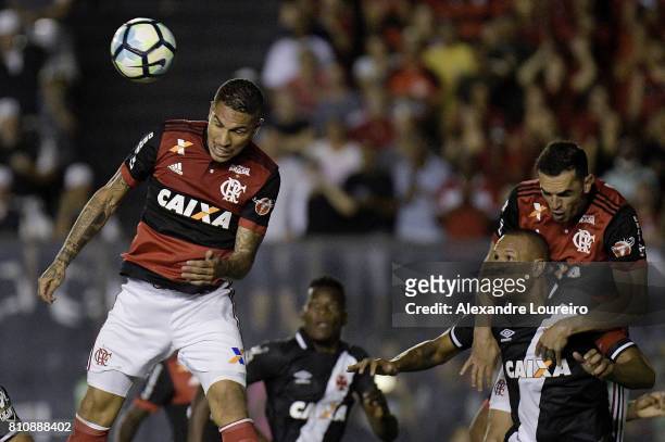 Guerrero and Rhodolfo of Flamengo battles for the ball with Luis Fabiano of Vasco da Gama during the match between Vasco da Gama and Flamengo as part...