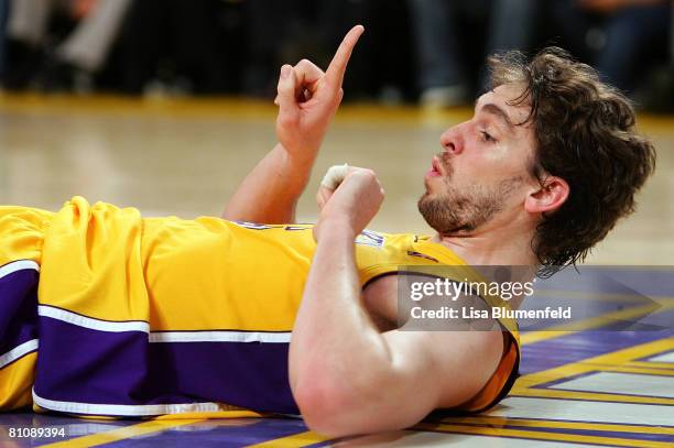 Pau Gasol of the Los Angeles Lakers lays on his back and raises a finger in the second quarter against the Utah Jazz in Game Five of the Western...