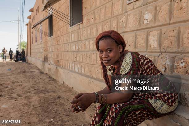 NA malian woman is seen sitting in the street on August 11, 2013 in Timbuktu, Mali"nIn January 2012 a Tuareg rebellion began in Northern Mali, led by...