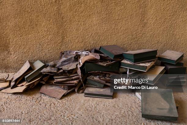 NEmpty boxes from the manuscripts that were burned by the Islamist rebels are seen at the Ahmed Baba Institute on August 12, 2013 in Timbuktu,...