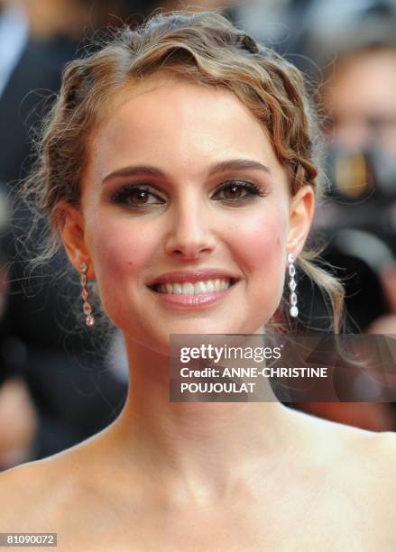 Israeli-US actress and member of the Jury Natalie Portman poses as she arrives to attend the opening ceremony and the screening of Brazilian director...