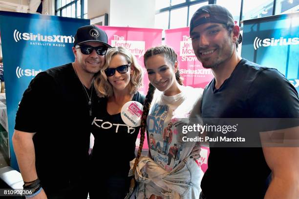 Donnie Wahlberg, Jenny McCarthy, Ashley Iaconetti and Jared Haibon on the set as Jenny McCarthy hosts her SiriusXM Show backstage at Fenway Park in...