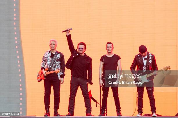 Adam Clayton , Bono, Larry Mullen Jr. And The Edge of U2 performing at Twickenham Stadium on July 8, 2017 in London, England.
