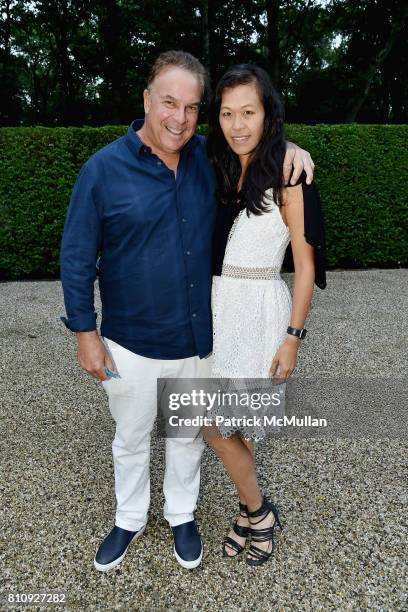 Jeff Greene and Mae Sze Greene attend Katrina and Don Peebles Host NY Mission Society Summer Cocktails at Private Residence on July 7, 2017 in...