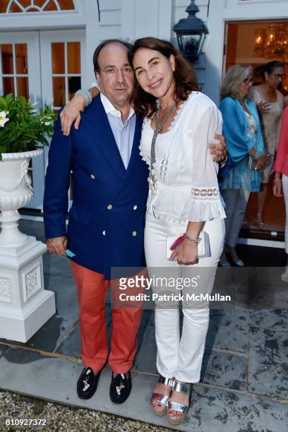 John Bader and Peggy Bader attend Katrina and Don Peebles Host NY Mission Society Summer Cocktails at Private Residence on July 7, 2017 in...