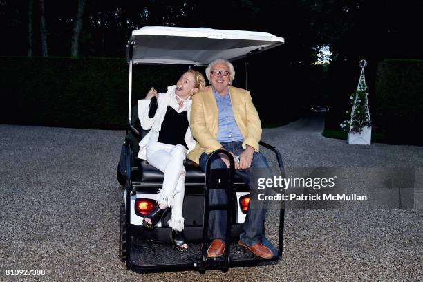 Robin Cofer and Dominick D'Alleva attend Katrina and Don Peebles Host NY Mission Society Summer Cocktails at Private Residence on July 7, 2017 in...