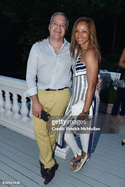 Michael Weil and Shirley Madhere-Weil attend Katrina and Don Peebles Host NY Mission Society Summer Cocktails at Private Residence on July 7, 2017 in...