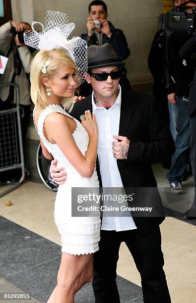 Paris Hilton and her boyfriend Benjy arrive at Selfridges to launch her new perfume 'Can Can' on May 15, 2008 in London, England.