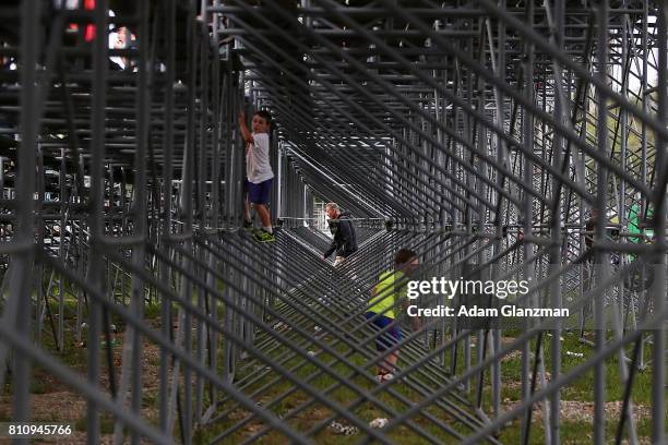 Young fans climb the bleachers before the NASCAR K&N Pro Series East at Thompson Speedway Motorsports Park on July 8, 2017 in Thompson, Connecticut.