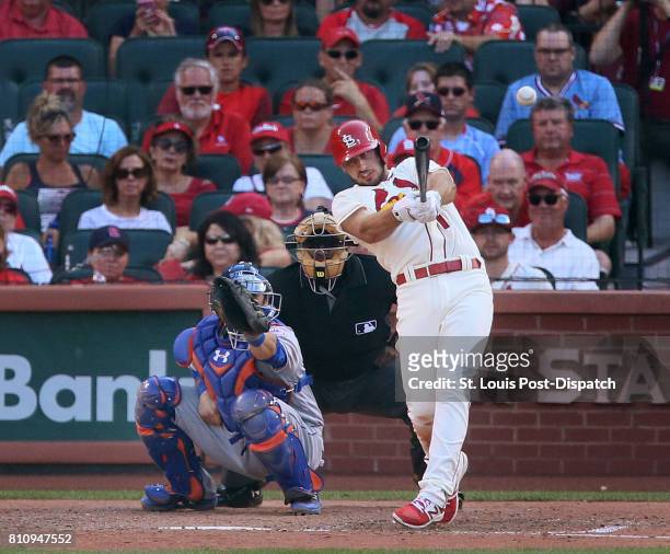 The St. Louis Cardinals' Paul DeJong hits a double in the eighth inning, one of his four extra-base hits on the day, against the New York Mets on...